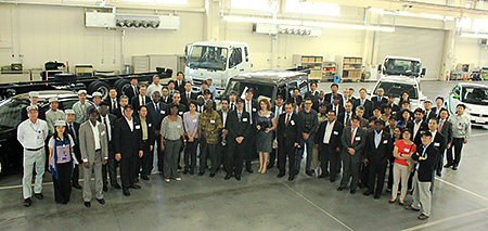 Group photo with Ambassadors and Diplomats, end of MFTBC’s Kawasaki Plant assembly line